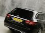 Mercedes-Benz C-klasse 180 AMG Sport Automaat (GROOT NAVI, PANAMERICANA GRILL, LEDER, STOELVERWARMING, GETINT GLAS, SPORTSTOELEN, CRUISE, NIEUWE APK, NIEUWSTAAT)