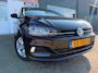 Volkswagen Polo 1.0 TSI Comfortline 5 drs in automaat en parkeersensoren en trekhaak en navigatie en bluetooth en cruise controle