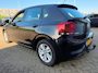 Volkswagen Polo 1.0 TSI Comfortline 5 drs in automaat en parkeersensoren en trekhaak en navigatie en bluetooth en cruise controle