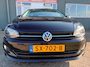 Volkswagen Polo 1.0 TSI Comfortline 5 drs in automaat en parkeersensoren en trekhaak en navigatie en bluetooth en cruise controle