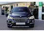 BMW X1 sDrive20i Orange Edition II | Panorama | Trekhaak | ACC | Leer | H/K