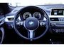 BMW X1 sDrive20i Orange Edition II | Panorama | Trekhaak | ACC | Leer | H/K