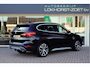 BMW X1 sDrive20i Orange Edition II | Panorama | Trekhaak | ACC | Leer | H/K