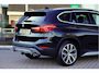 BMW X1 sDrive20i Orange Edition II | Panorama | Trekhaak | ACC | Leer | H/K