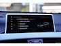 BMW X1 sDrive20i Orange Edition II | Panorama | Trekhaak | ACC | Leer | H/K