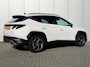Hyundai Tucson 1.6 T-GDI PHEV Comfort Smart 4WD / Stoelverwarming / Stuurverwarming / Achteruitrijcamera / Parkeersensoren Voor + Achter / Navigatie / Apple Carplay & Android Auto / | Achteruitrijcamera | Airco (automatisch) | Apple Carplay/Android Auto|telefoonintegratie premium