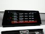 BMW X1 xDrive25e Advantage PHEV 221pk Dealer O.H | SOH 87,9% | Trekhaak Afn. | Adaptive Cruise | Head Up | Camera | Sportstoelen Memory & Verwarmd | Stuur Verwarmd | Sfeerverlichting | Navigatie | DAB | 17"L.M | Plug In Hybrid |
