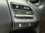 Hyundai Kona Electric EV Premium 64 kWh / 64 kWh accupakket / Volledig elektrisch / Actieradius tot 449 km WLTP / Premium uitvoering / Warmtepomp / Head-up display / Lederen bekleding / Elektrisch verstelbare stoelen / Stoelverwarming en stoelventilatie / Stuurwielverwarming / Adaptieve cruise control / Krell premium audiosysteem / Navigatiesysteem / Achteruitrijcamera / Parkeersensoren voor en achter / Dodehoekdetectie / Apple CarPlay & Android Auto / Keyless entry & start / LED-verlichting