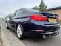 BMW 3-Serie 320i High Executive | Airco | Cruise Control | Trekhaak | NAVI | Bluetooth | Leder