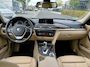 BMW 3-Serie 320i High Executive | Airco | Cruise Control | Trekhaak | NAVI | Bluetooth | Leder