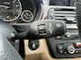 BMW 3-Serie 320i High Executive | Airco | Cruise Control | Trekhaak | NAVI | Bluetooth | Leder