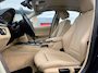 BMW 3-Serie 320i High Executive | Airco | Cruise Control | Trekhaak | NAVI | Bluetooth | Leder