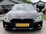 BMW 3-Serie 320i High Executive Automaat 2012 Zwart Xenon
