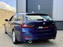 BMW 3-Serie Touring 320e LCi *90% SOH* Phytonicblau / Laser LED / Stuur/Stoelverwarming / Elek. Trekhaak / Apple Carplay / Adapt. Cruise / Keyless