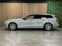 Volvo V60 T6 AWD Recharge Ultra Dark | Trekhaak | Schuifdak | Head-Up Display | Harman Kardon | Adaptieve Cruise Control | Stoelverwarming voor+achter | Stuurwielverwarming | 18 Inch | Full LED Meesturende koplampen | Parkeercamera | Pilot Assist | BLIS Dode Hoek Detectie | Elektrische voorstoelen geheugen | Lederen bekleding | Zitting verlenging voorstoelen | Lederen dashboard | Google Infotainment | Keyless Drive | Parkeersensoren voor+achter | Privacy Glass | Elektrisch bedienbare achterklep | DAB Radio | Apple Carplay/Android Auto | Volvo On Call met mobiele App functie | Onyx Black Metallic |