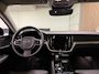 Volvo V60 T6 AWD Recharge Ultra Dark | Trekhaak | Schuifdak | Head-Up Display | Harman Kardon | Adaptieve Cruise Control | Stoelverwarming voor+achter | Stuurwielverwarming | 18 Inch | Full LED Meesturende koplampen | Parkeercamera | Pilot Assist | BLIS Dode Hoek Detectie | Elektrische voorstoelen geheugen | Lederen bekleding | Zitting verlenging voorstoelen | Lederen dashboard | Google Infotainment | Keyless Drive | Parkeersensoren voor+achter | Privacy Glass | Elektrisch bedienbare achterklep | DAB Radio | Apple Carplay/Android Auto | Volvo On Call met mobiele App functie | Onyx Black Metallic |
