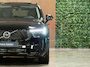 Volvo XC90 T8 AWD Recharge Ultra Dark | Facelift | Luchtvering | Trekhaak | 360 Camera | Head-Up Display | Harman Kardon | 455pk | Adaptieve Cruise Control | Stoelverwarming voor+achter | Stuurwielverwarming | Schuifdak | Full LED Meesturende koplampen | Pilot Assist | BLIS Dode Hoek Detectie | Alcantara hemelbekleding | Lederen zonnekleppen en handgrepen | Elektrische voorstoelen geheugen | Quilted Nordico bekleding | Zitting verlenging voorstoelen | Lederen dashboard | 21 Inch | Google Infotainment | Keyless Drive | Privacy Glass | Elektrisch bedienbare achterklep | Geïntegreerd kinderzitje achterin | Geïntegreerde zongordijnen achterportieren | Verlichte instaplijsten | 7-Persoons | 4-Zone Climate Control | DAB Radio | Apple Carplay/Android Auto | Alarm Klasse III | Onyx Black Metallic |