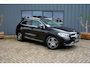 Mercedes-Benz GLA 180 Business Line 136pk Aut. * Leer * Navi * Carplay/Android * Cruise * Stoelverwarming * PDC V+A * Top
