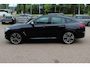 BMW X4 M40i High Exe. M Sport 73.952 km NL Auto. / Trekhaak / Panoramadak / Camera / Head-up / Luxe Leder / 21'' / Harman Kardon / Navigatie / Stuur+Stoelverwarming / DAB / Dodehoek / Cruise Control