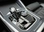 BMW X6 M50d 400 PK xDrive High Executive M Sport Trekhaak Laser licht Panoramadak Sky Lounge Achterasbesturing Stoelventilatie en Massage