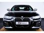 BMW 4-Serie Cabrio M440i High Executive Driving Assistant Professional - Head up - Harman Kardon - BMW Laserlight - Comfort Access - Windscherm - Air collar - Stuurwielrand verwarmd - Parking Assistant Plus