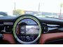 MINI Cooper Cabrio 1.5 l Chester bruin leer l Harman kardon audio l Head-up display l Stoelverwarming l PDC l  l Lendesteun Verstelbaar l  l Keyless l JOHN COOPER WORKS l BRITISCH RACING GREEN l PREMIUM PAKKET