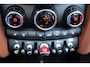 MINI Cooper Cabrio 1.5 l Chester bruin leer l Harman kardon audio l Head-up display l Stoelverwarming l PDC l  l Lendesteun Verstelbaar l  l Keyless l JOHN COOPER WORKS l BRITISCH RACING GREEN l PREMIUM PAKKET