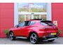 Alfa Romeo Tonale 1.3 270PK Ibrida Plug-In Q4 SPORT SPECIALE | PANORAMISCH SCHUIF KANTELDAK MET ZWARTE DAKSTRIPS | ROSSO BRERA (METALLIC ROOD) MET ZWART DAK  | HARMAN KARDON PREMIUM AUDIO MET 14 SPEAKERS | TECHNOLOGY PACK: PARKEERWAARSCHUWING VOOR EN ACHTER/360° CAMERA / AUTONOMOUS DRIVING LEVEL 2: ADAPTIVE CRUISE CONTROL/LANE CENTERING ASSIST/TRAFFIC JAM ASSIST DODEHOEK DETECTIE AUTOMATISCH DIMMENDE BUITENSPIEGELS ELEKTRISCH BEDIENBARE ACHTERKLEP | 20" LICHTMETALEN VELGEN FORI | DRAADLOZE TELEFOONLADER | NAVIGATIE | DRAADLOZE APPLE CARPLAY/ANDROID AUTO | FULL LED MATRIX KOPLAMPEN | LEDEREN BEKLEDING / ALCANTARA BEKLEDING | ZWART GESPOTEN BREMBO REMKLAUWEN MET WITTE LETTERS | DUAL STAGE VALVE ACTIVE OPHANGING (DSV) MET ELEKTRONISCH GEREGELDE DEMPING |
