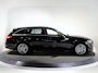 Mercedes-Benz C-klasse Estate 300 e AMG Line | Panoramadak | Memory | Trekhaak | Stoelverwarming | Achteruitrijcamera | Sfeerverlichting |