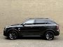 Lynk & Co 01 1.5 PHEV 261pk Blackline | Zwarte hemel | Rolhoes | 360 camera | Panoramadak | 20 inch velgen | Adaptieve cruise | Navigatie | CarPlay | Keyless | LED | DAB | Infinity | Stoelverwarming | Elektrische achterklep | Volledig dealeronderhouden | Fabrieksgarantie