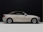 BMW 2-Serie Cabrio 218i Centennial High Executive [CRUISE CONTROL, STOELVERWARMING, PDC V+A, LEDER, CABRIO, NAVIGATIE, BLUETOOTH, CLIMATE CONTROL, RADIO, MULTIFUNCTIONEEL STUURWIEL, AIRCO, XENON KOPLAMPEN, NIEUWSTAAT]