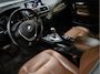 BMW 2-Serie Cabrio 218i Centennial High Executive [CRUISE CONTROL, STOELVERWARMING, PDC V+A, LEDER, CABRIO, NAVIGATIE, BLUETOOTH, CLIMATE CONTROL, RADIO, MULTIFUNCTIONEEL STUURWIEL, AIRCO, XENON KOPLAMPEN, NIEUWSTAAT]