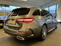 Mercedes-Benz C-klasse Estate 200 4MATIC AMG Line | Panoramadak | Elek. wegklapbare trekhaak | Memory seats | Achteruitrijcamera | Adaptieve cruise control | Climate control | Burmester | Sfeerverlichting | Apple carplay | Adaptief onderstel | Dodehoeksdetectie | Stoelverwarming