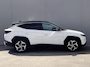 Hyundai Tucson 1.6 T-GDI PHEV Premium 4WD / Dealer Onderhouden / SOH 100 % / Lederen Bekleding / Navigatie / Electr. Stoelen met Geheugen / Stoelventilatie / Stuur-, Stoel- & Achterbankverwarming / Apple Carplay & Android Auto /