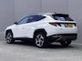 Hyundai Tucson 1.6 T-GDI PHEV Premium 4WD / Dealer Onderhouden / SOH 100 % / Lederen Bekleding / Navigatie / Electr. Stoelen met Geheugen / Stoelventilatie / Stuur-, Stoel- & Achterbankverwarming / Apple Carplay & Android Auto /