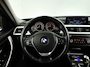 BMW 3-Serie Touring 320i Executive | Park assist | Stoelverwarming | Xenon