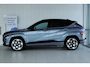 Hyundai Kona Electric Premium 65.4 kWh | Achterspoiler | Achterstoelen verwarmd | Achteruitrijcamera