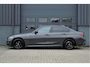 BMW 3-Serie 318i Business Edition | M-PAKKET | SCHUIFDAK | HIFI | CAMERA |