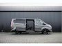 Ford Transit Custom 2.0 EcoBlue L2H1 | Platinum Edition | DC 5-Zits | Automaat | Camera | Cruise | 1e Eigenaar | PDC | Stoelverw. | Schuifdeur L+R | Trekhaak