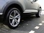 Volkswagen T-Roc 1.5 TSI Sport 150 pk DSG | Camera | Elektrische achterklep | Cruise control | Navi via App-Connect | Dodehoek detectie | Stoel- & Stuurverwarming | LED |