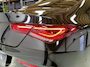 Mercedes-Benz CLA 200 AMG | Pano | Dodehoek | Beam | Stoelverwarming | Sfeer | Night | 18" | NAP | Camera | Leer/Alcantara | Verkeerslichtweergave+ | Widescreen | DYNAMIC