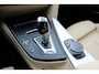 BMW 3-Serie 320i Corporate Lease High Executive / Trekhaak / Schuifdak / Leder / Navigatie / Parkeerhulp V+A / 18'' / Getint glas / Stoelverwarming / Cruise Control