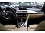 BMW 3-Serie 320i Corporate Lease High Executive / Trekhaak / Schuifdak / Leder / Navigatie / Parkeerhulp V+A / 18'' / Getint glas / Stoelverwarming / Cruise Control