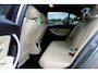 BMW 3-Serie 320i Corporate Lease High Executive / Trekhaak / Schuifdak / Leder / Navigatie / Parkeerhulp V+A / 18'' / Getint glas / Stoelverwarming / Cruise Control
