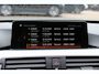 BMW 3-Serie 320i Corporate Lease High Executive / Trekhaak / Schuifdak / Leder / Navigatie / Parkeerhulp V+A / 18'' / Getint glas / Stoelverwarming / Cruise Control