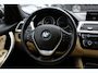 BMW 3-Serie 320i Corporate Lease High Executive / Trekhaak / Schuifdak / Leder / Navigatie / Parkeerhulp V+A / 18'' / Getint glas / Stoelverwarming / Cruise Control