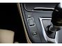 BMW 3-Serie 320i Corporate Lease High Executive / Trekhaak / Schuifdak / Leder / Navigatie / Parkeerhulp V+A / 18'' / Getint glas / Stoelverwarming / Cruise Control