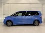 Volkswagen Multivan 1.4 eHybrid Life 7p. TREKHAAK/EL.SCHFDEUREN+SCHUIFRUITJES/ACC/SFEER/SOH 93%/CAMERA/CARPLAY/KEYLESS/LED/EL.A.KLEP/MIDDENCONSOLE/DODE-HOEK/PRIVACY/17"BLACK/FLORIDA-BEACH BLUE METALLIC/VOLLEDIG VW DEALER HISTORIE