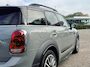 MINI Countryman 1.5 Cooper S E ALL4 | Orig. NL | PanoramaDak | JCW-pakket | Carplay | Camera | Head-Up display |