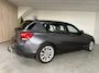 BMW 1-Serie 116i EDE Upgrade Edition Airco, Navigatie, Leder interieur, LMV